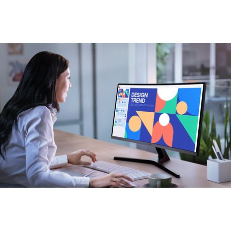Office desk setup with the Samsung curved monitor in work mode, emphasizing wide screen space.