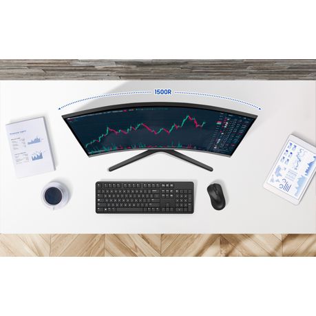 Overhead shot of the Samsung curved monitor highlighting slim bezels and screen curve.