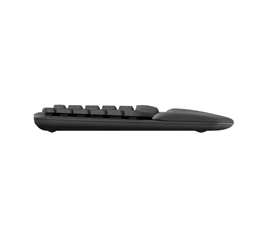 Side profile of Logitech Wave Keys ergonomic keyboard showing curved key design and palm rest for comfortable typing