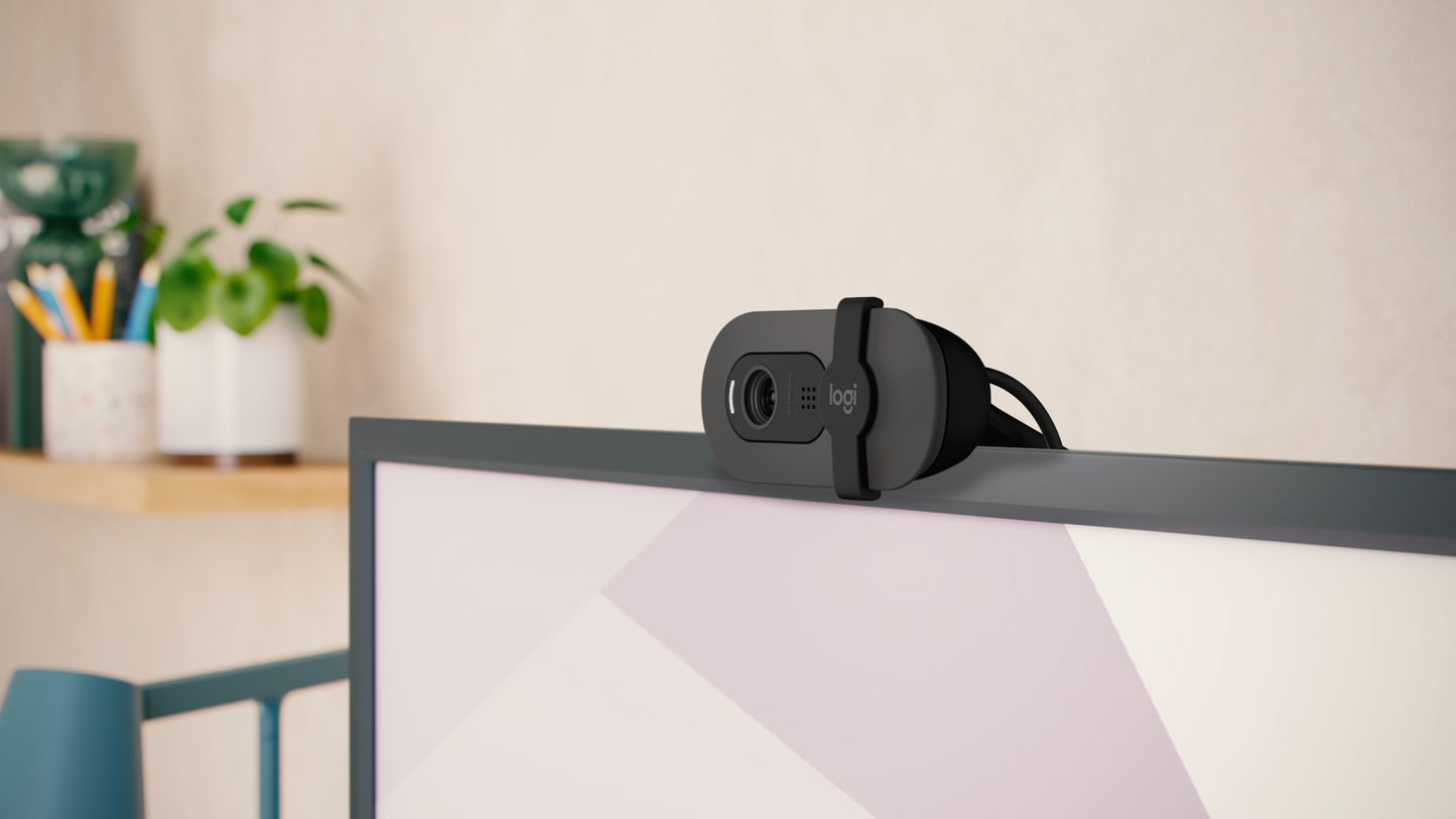 Logitech Brio 100 Webcam used on a laptop for video calls, online meetings, and streaming